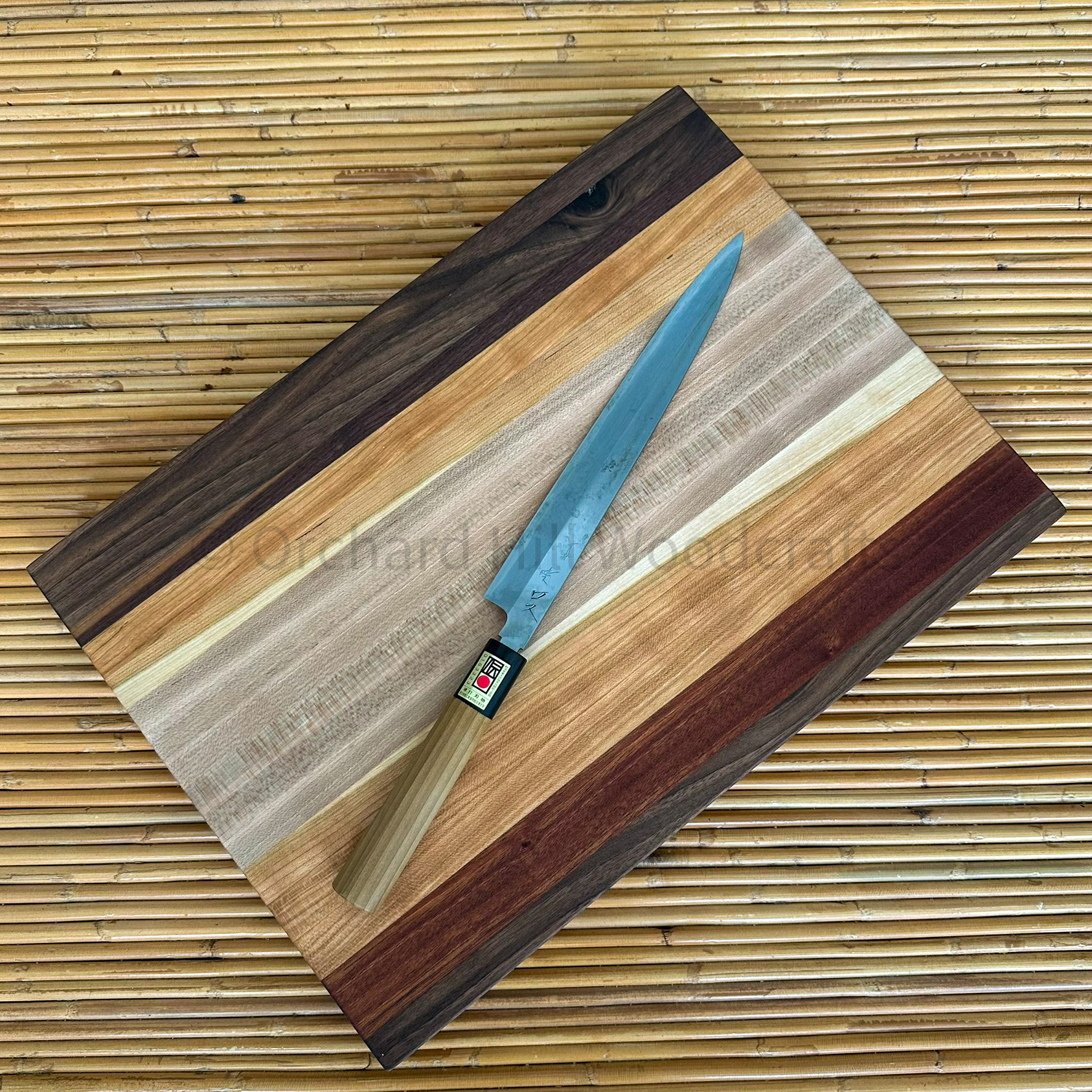 Maple, cherry, sapele and walnut cutting board